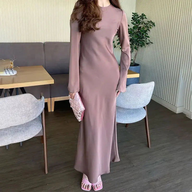 Summer 2026 Women s Temperament Solid Color Long Sleeved Round Neck Waist Cinched Hip Wrapping French Jumpsuit Casual Daily Wear