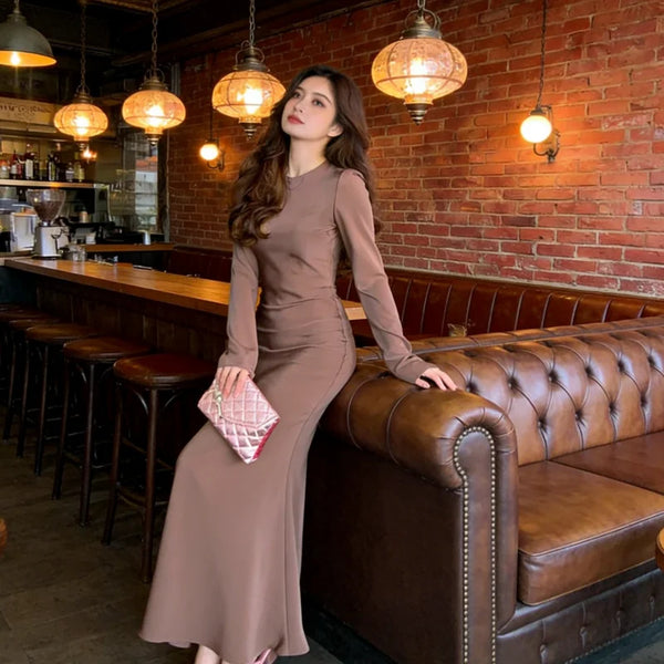 Summer 2026 Women s Temperament Solid Color Long Sleeved Round Neck Waist Cinched Hip Wrapping French Jumpsuit Casual Daily Wear